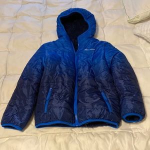 Eddie Bauer reversible waterproof puffer jacket with faux shearling lining.